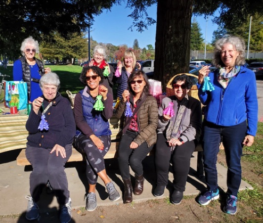In early December Club members spent a sunny morning at Town Park making origami trees and stars.